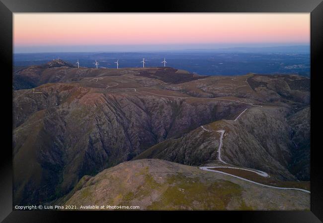 Serra da Freita drone aerial view in Arouca Geopark road with wind turbines at sunset, in Portugal Framed Print by Luis Pina