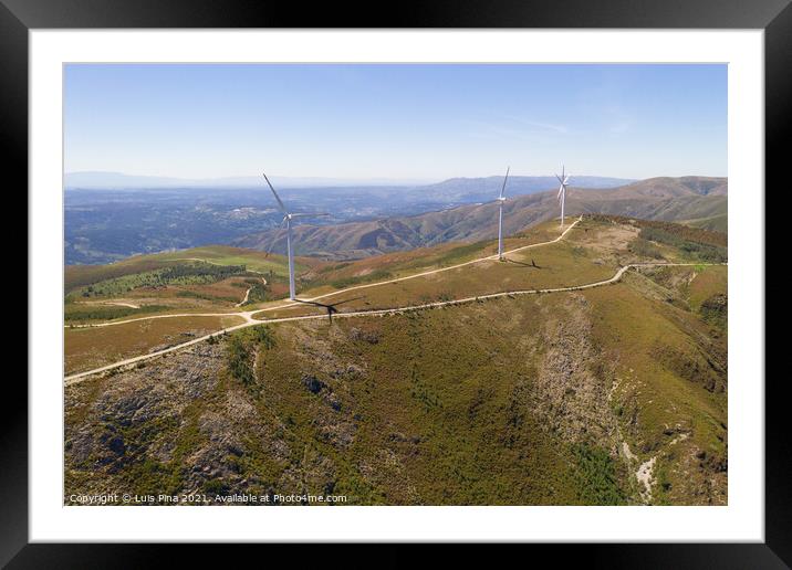 Wind turbines drone aerial view renewable energy on the middle of Serra da Freita Arouca Geopark, in Portugal Framed Mounted Print by Luis Pina