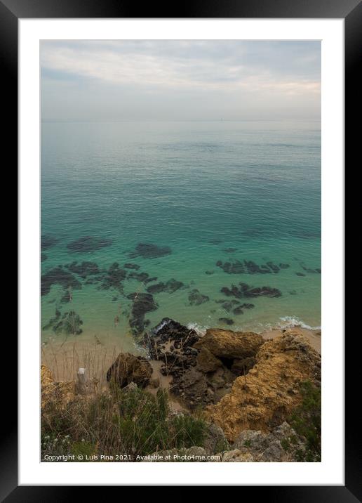 Paradise turquoise green calm transparent water with rocks Framed Mounted Print by Luis Pina