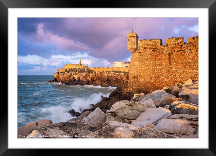 Peniche Fortress at sunset with beautiful golden light with sea waves crashing on the rocks, in Portugal Framed Mounted Print by Luis Pina