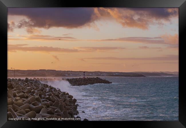 Peniche lighthouse with Supertubos beach on the background at sunset with waves crashing, in Portugal Framed Print by Luis Pina