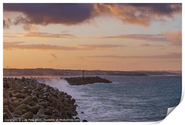 Peniche lighthouse with Supertubos beach on the background at sunset with waves crashing, in Portugal Print by Luis Pina
