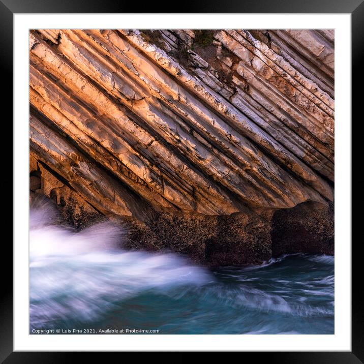Beautiful schist cliff details in Baleal island with ocean waves crashing in Peniche, Portugal Framed Mounted Print by Luis Pina