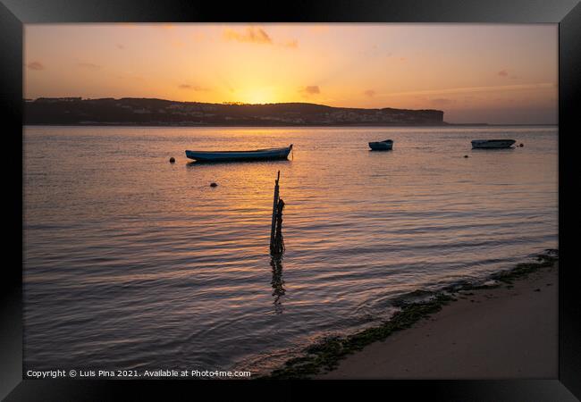 Fishing boats on a river sea at sunset in Foz do Arelho, Portugal Framed Print by Luis Pina