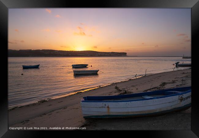 Fishing boats on a river sea at sunset in Foz do Arelho, Portugal Framed Print by Luis Pina