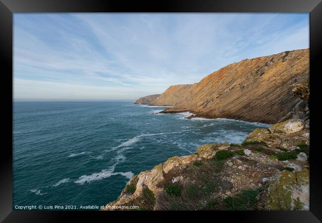 Sea cliffs landscape in Cabo Espichel at sunset, in Portugal Framed Print by Luis Pina
