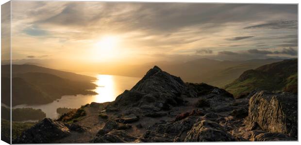 A hazy sunset over Loch Katrine  Canvas Print by Anthony McGeever