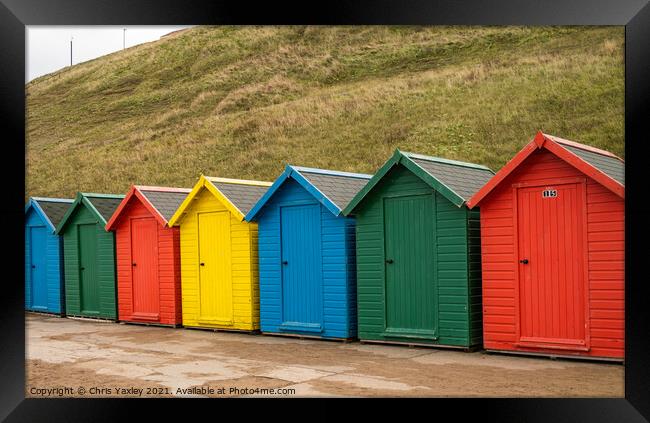 Whitby beach huts Framed Print by Chris Yaxley