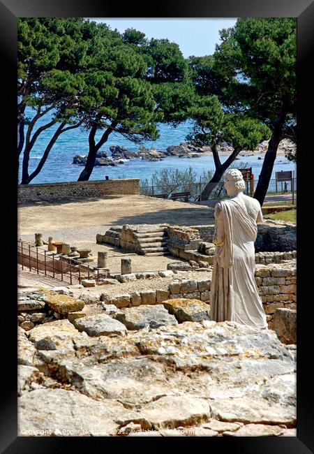 Overlooking the Ancient Empuries Framed Print by Roger Mechan