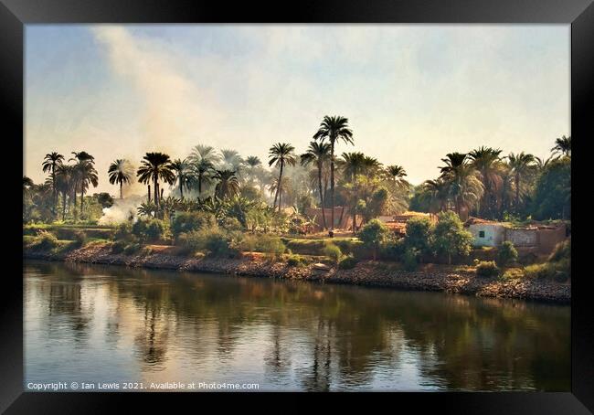 A Village By The River Nile Framed Print by Ian Lewis