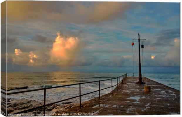 Sunrise over Porthleven Harbour, photographed from the jetty Canvas Print by Gordon Maclaren