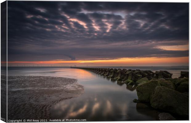 Breakwaters at the Wirral peninsular, at sunset Canvas Print by Phil Reay