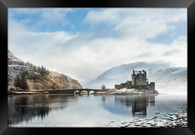 Eilean Donan Castle, after a winter storm Framed Print by Justin Foulkes