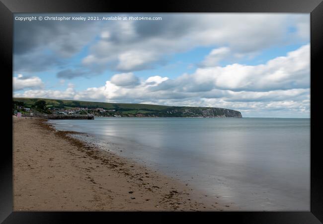 Clouds over Swanage, Dorset Framed Print by Christopher Keeley