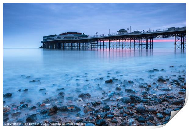 Pebbles and Pier Print by Rick Bowden