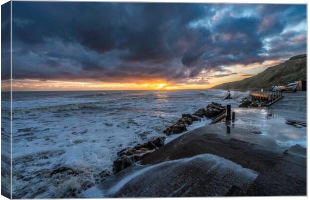 High tide sunrise on Mundesley seafront Canvas Print by Andrew Sharpe