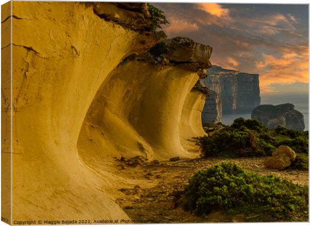 Sunset with Wave Rock Formation at Dwejra Bay, Mal Canvas Print by Maggie Bajada