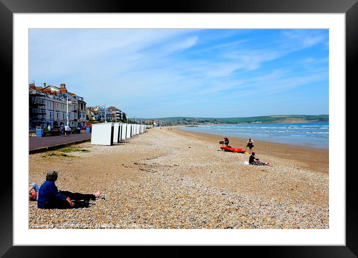 Seasonal beach huts, Weymouth, Dorset, UK. Framed Mounted Print by john hill
