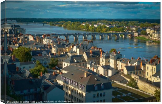Saumur, rooftops view over the River Loire Canvas Print by Chris Rose