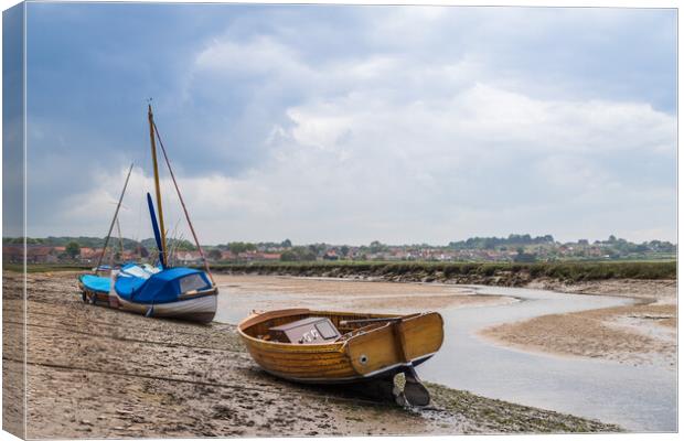Wooden boats at Blakeney Canvas Print by Jason Wells