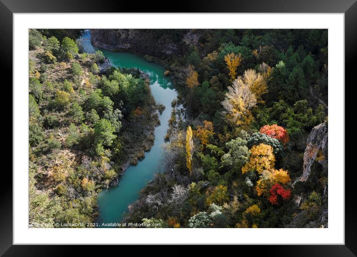 Colorful display of trees next to a river in fall season in Spain Framed Mounted Print by Lensw0rld 