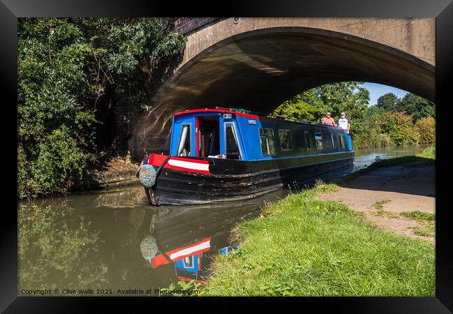 Narrowboat under Candle Bridge Framed Print by Clive Wells