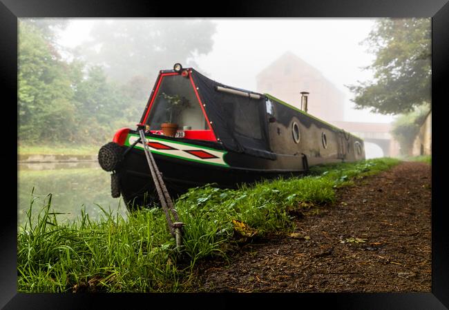 Moored narrow boat in the mist. Framed Print by Clive Wells