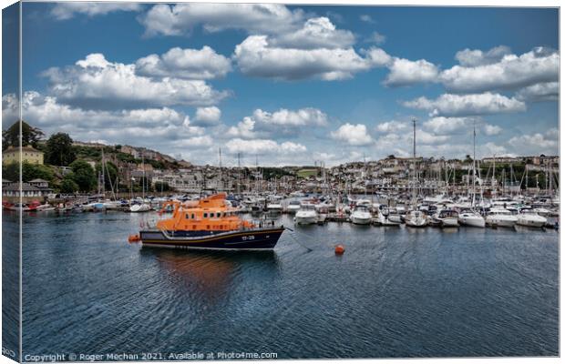 Brixham lifeboat and marina  Canvas Print by Roger Mechan