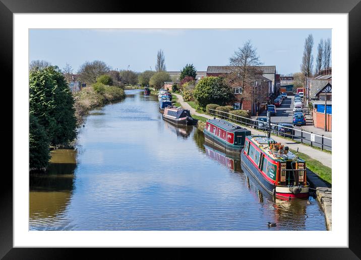 Narrow boats lined up at Burscough Framed Mounted Print by Jason Wells