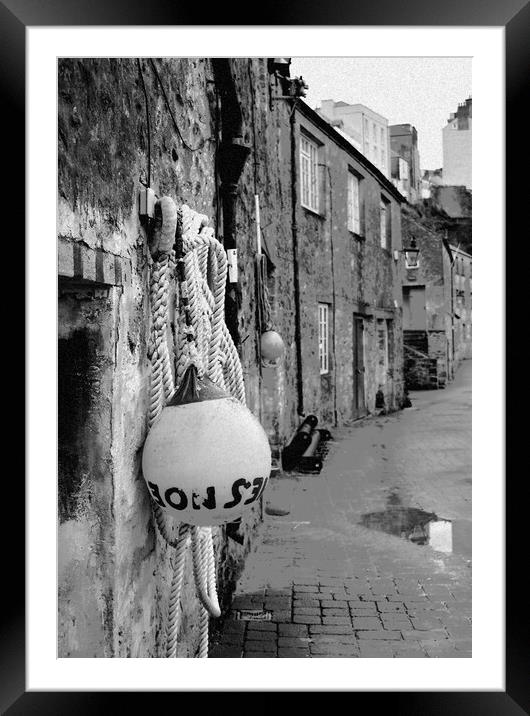 Outdoor street near Tenby Harbour in Pembrokeshire, West Wales Framed Mounted Print by Jonathan Evans