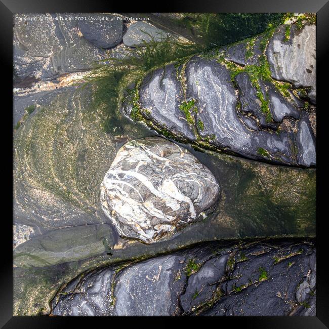 Rocks on the beach at Crackington Haven, Cornwall Framed Print by Derek Daniel