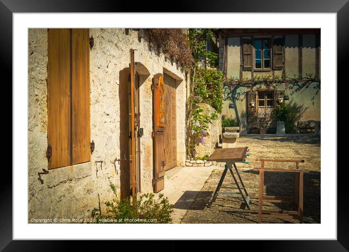 Pujols, traditional wooden shutters being repaired Framed Mounted Print by Chris Rose