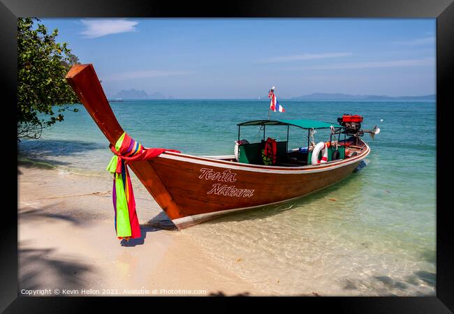 Long tail boat beached on Naka Island, Phuket Framed Print by Kevin Hellon