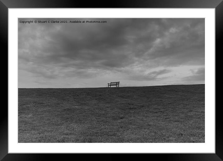 The lone bench Framed Mounted Print by Stuart C Clarke