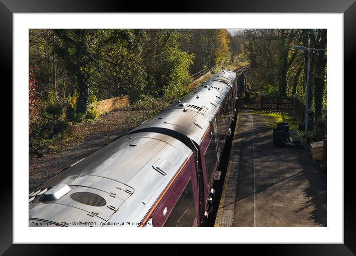 Train now leaving Framed Mounted Print by Clive Wells