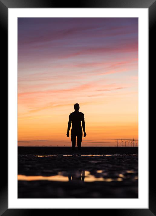 Iron Man watching the windmills spinning Framed Mounted Print by Jason Wells