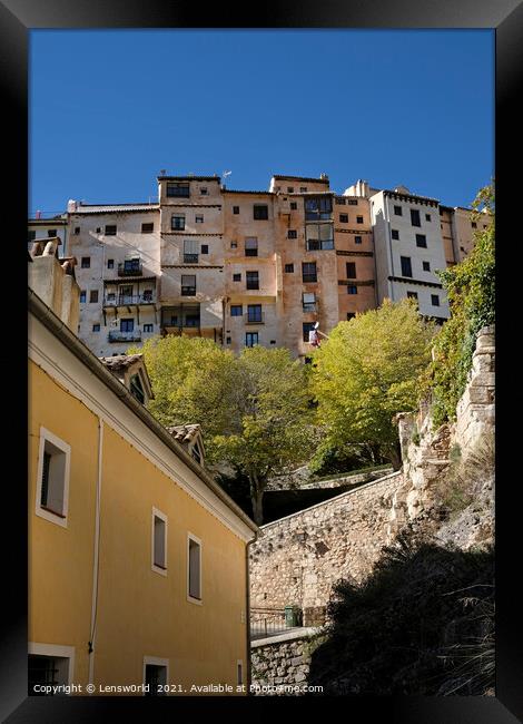 Beautiful buildings in Cuenca, Spain, on a sunny day Framed Print by Lensw0rld 