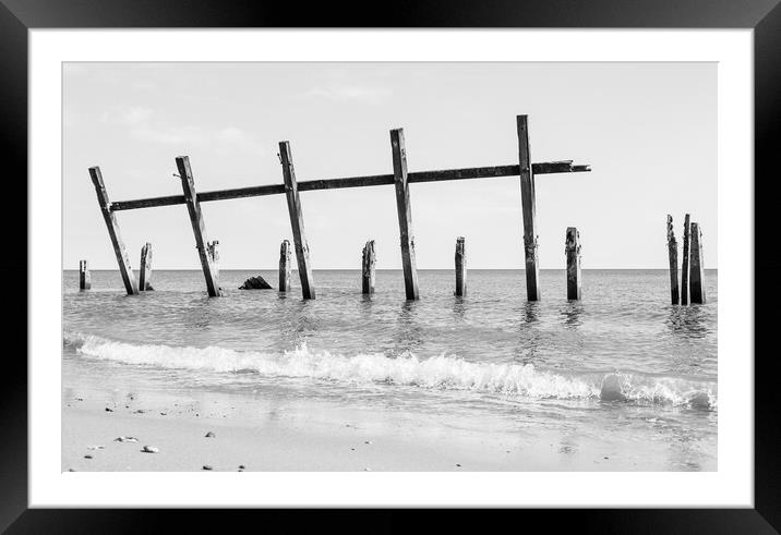 Happisburgh revetments in the sea Framed Mounted Print by Jason Wells