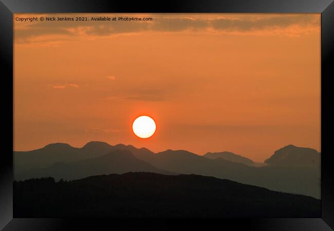 Sun setting over the Lake District  Framed Print by Nick Jenkins