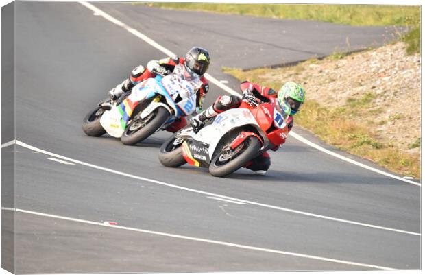 IOM TT road races, Cameron Donald leading Bruce Anstey Canvas Print by Russell Finney