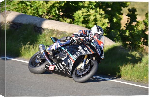 IOM TT road races, Micheal Dunlop racing Canvas Print by Russell Finney
