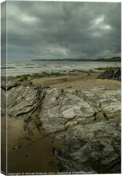 Grey Skies over Carne Beach in Cornwall Canvas Print by Michael Shannon