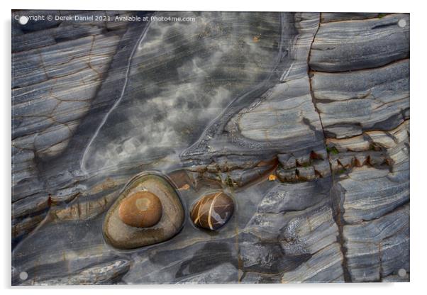 Rocks on the beach at Sandymouth Acrylic by Derek Daniel