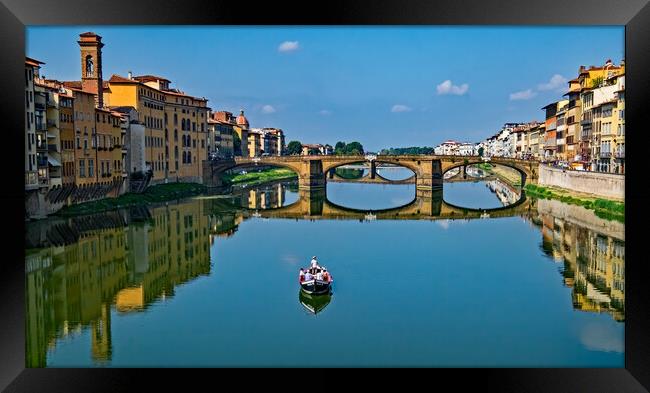 A boat on the Arno River, Florence Framed Print by Joyce Storey