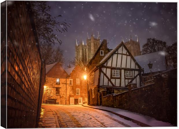 Snow falling on Michaelgate, Lincoln Canvas Print by Andrew Scott