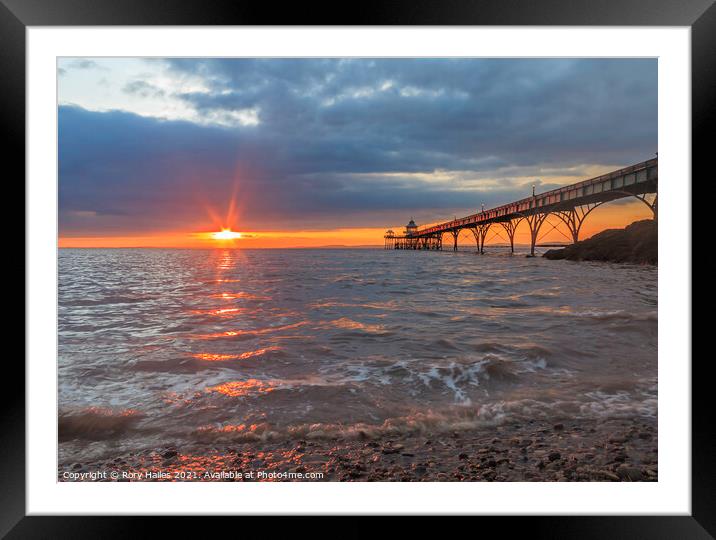 Clevedon Pier with lens flare Framed Mounted Print by Rory Hailes