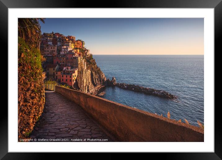 Manarola village and stone trail. Cinque Terre, Italy Framed Mounted Print by Stefano Orazzini