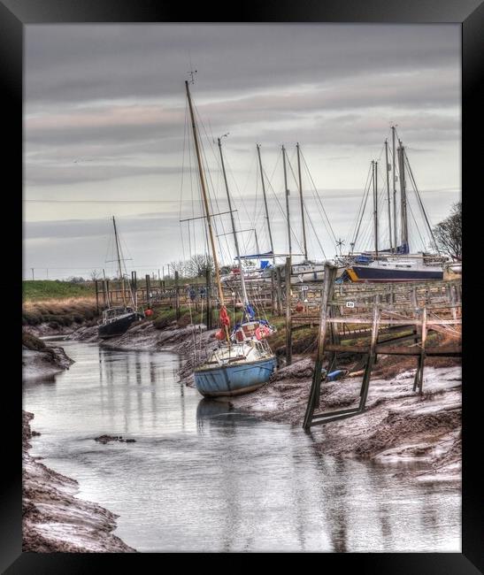 Waiting for the Tide Framed Print by Jon Fixter