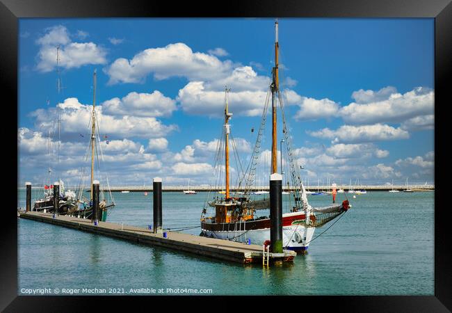 Classic yachts on the Isle of Wight Framed Print by Roger Mechan