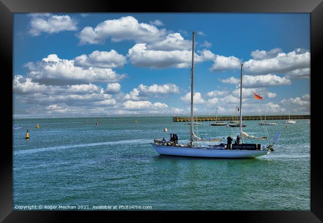 Gypsy Moth 1V leaving the harbour on the Isle of W Framed Print by Roger Mechan
